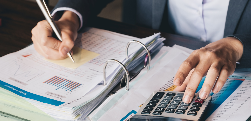 Tax Accountants reviewing financial data representing Individual Income Tax Services in Billings