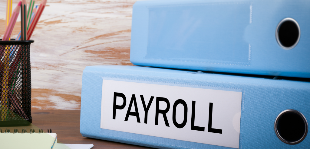 Time-consuming Payroll binders representing need for Faster Payroll Services for a Small Business in Billings, MT