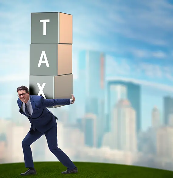 Computer graphic, man under a heavy tax burden, representing need for individual income tax services in Billings, MT
